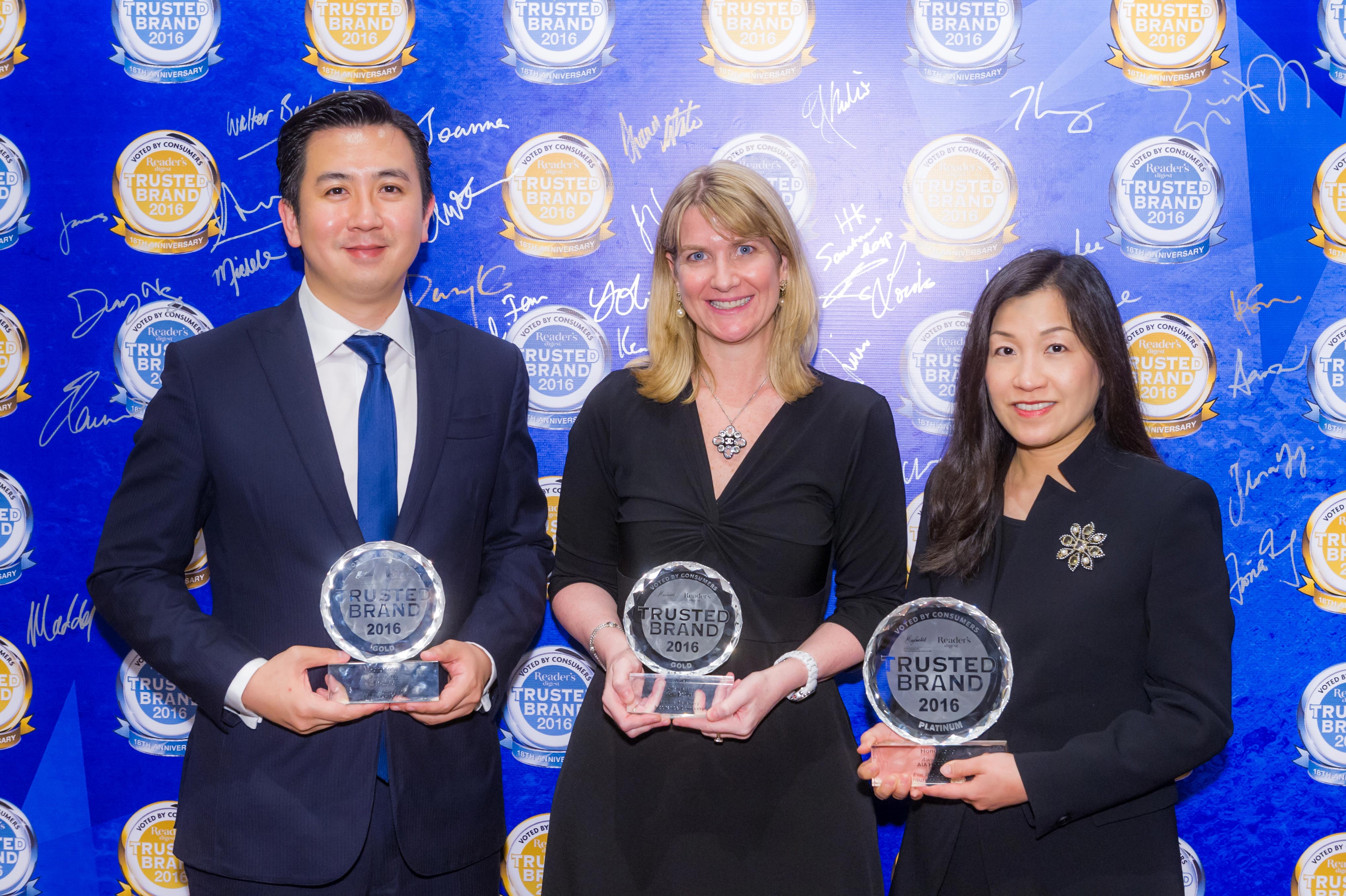 (From left to right) Mr Stephen Fung, Chief Executive Officer of AIA MPF; Ms Michele Flanagan, Director of Marketing, Group Strategy, Customer Propositions & Marketing, AIA Group and Ms Bonnie Tse, General Manager, Business Strategy and Marketing of AIA Hong Kong and Macau receive the “Reader’s Digest Trusted Brands” Awards.