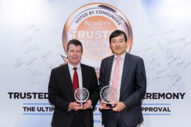 Mr. Jacky Chan (Right), Chief Executive Officer, AIA Hong Kong and Macau and Mr. Mark Saunders (Left), Group Chief Strategy and Marketing Officer of AIA Group, receive the “Reader’s Digest Trusted Brand” award on behalf of AIA Hong Kong and AIA Group respectively